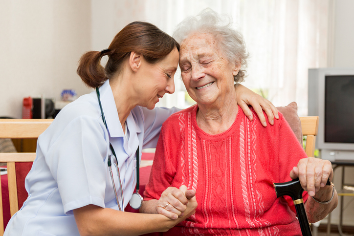 Nurse and senior patient bonded at long-term care center in Shreveport, LA