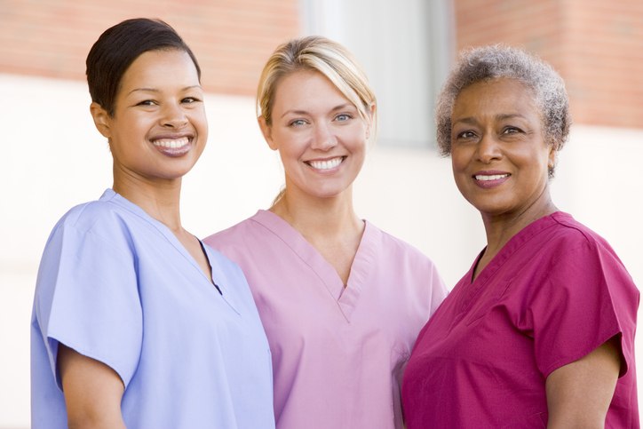Three women in scrubs highlight friendly staff at Shreveport Manor Skilled Nursing, LA